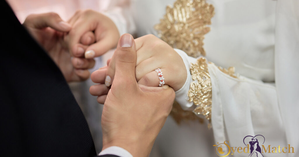 married couple holding hands